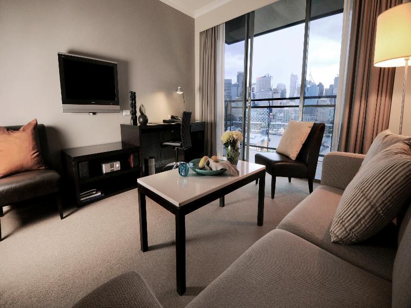 The Star Grand Hotel And Residences Sydney Buitenkant foto A living room in a serviced apartment in Singapore